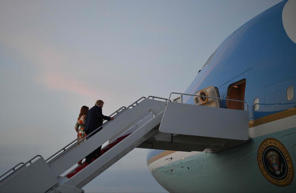  The Trumps boarding Air Force One near Washington to travel to Britain