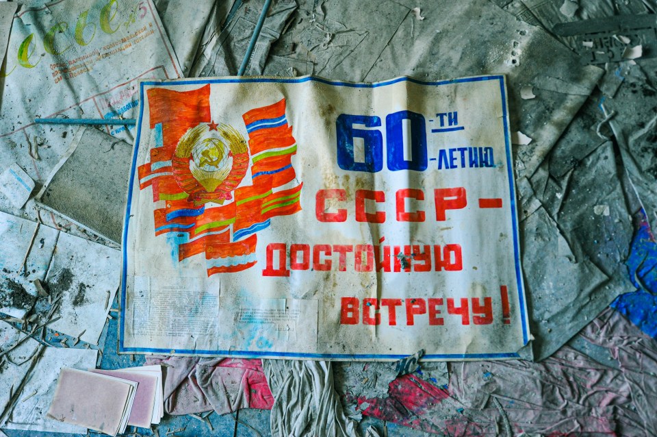  A poster celebrating the founding of the USSR on the floor of an office in Pripyat