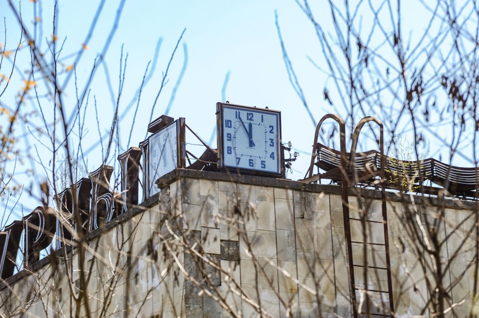  A clock on the roof of a local swimming pool