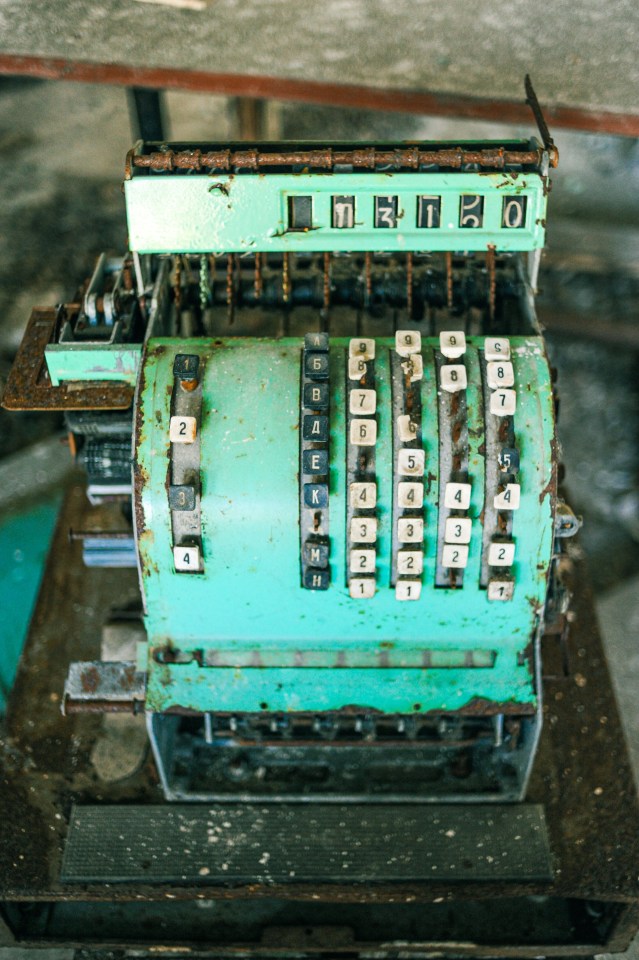  A rusting cash register in a school canteen in Pripyat, Chernobyl