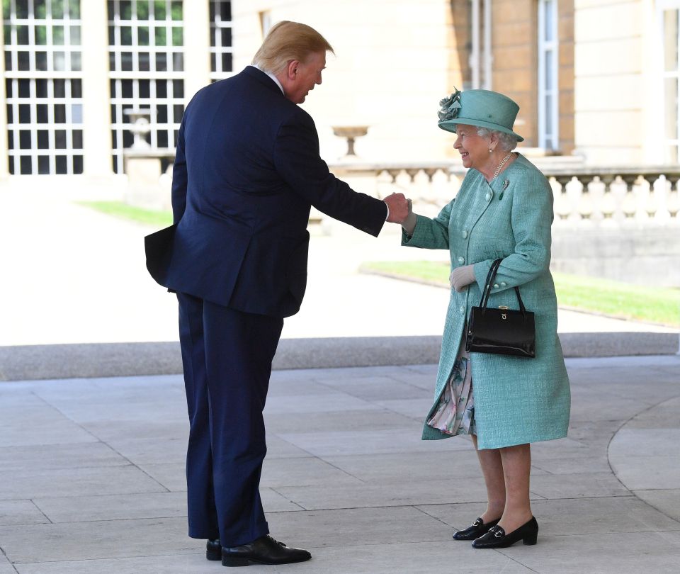  The President shaking hands with Her Majesty - online wags said it looked like they were bumping fists