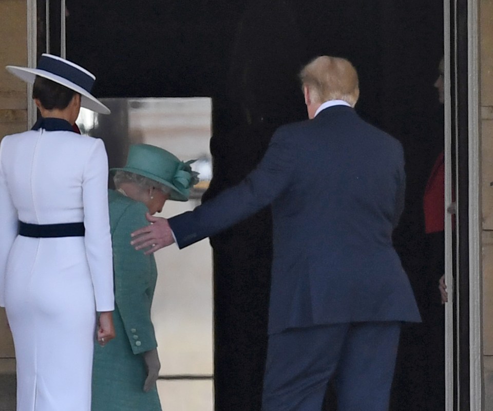  Mr Trump was keen to let the Queen lead the way as he gestured for her to enter the palace first