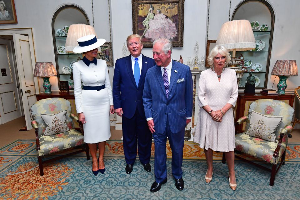  The two couples posing for photos at Charles's residence