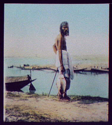  A fisherman holding his catch