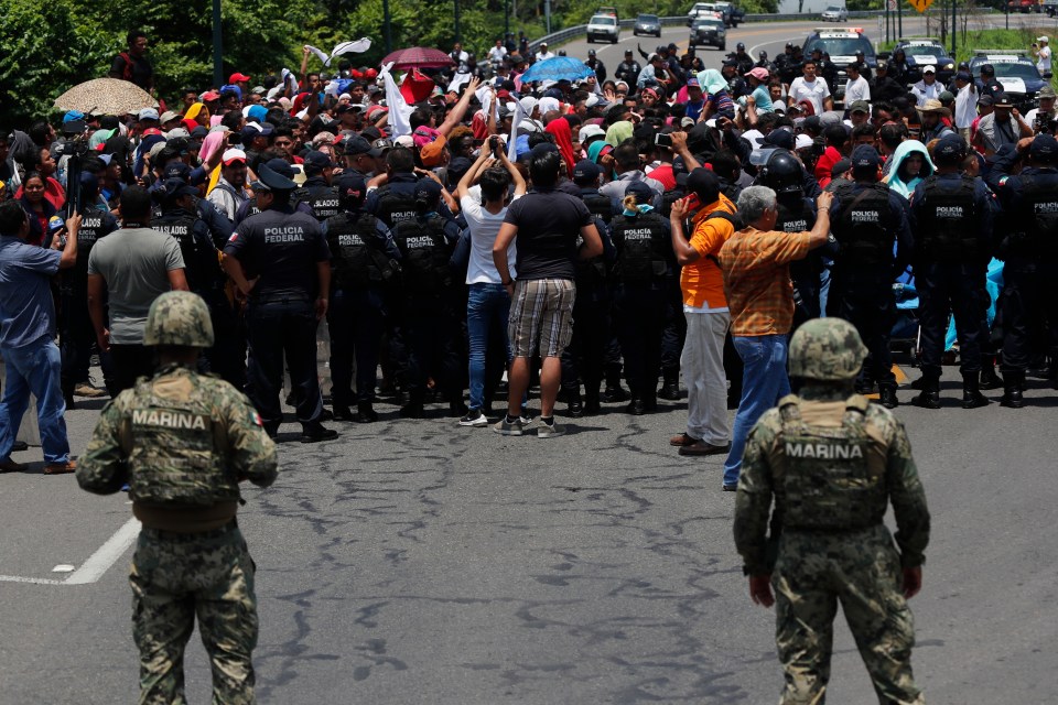  Mexican authorities stop a migrant caravan from South America