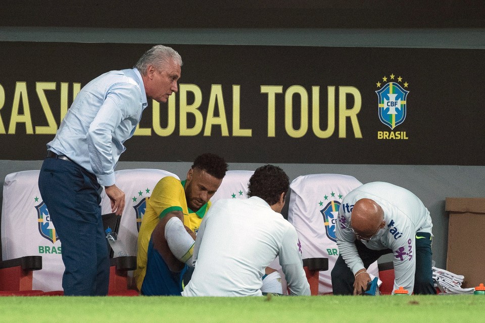  Neymar was tended to on the bench following the blow