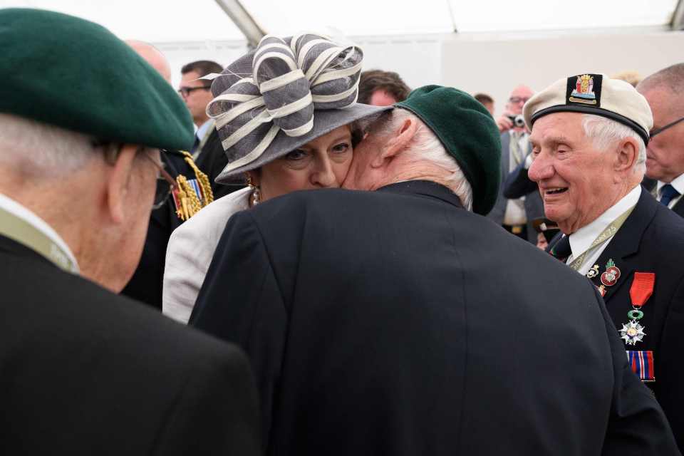  Ex-Marine Robert Yaxley, 94, from Chelmsford, even pinched a kiss with the PM, on her last day in office