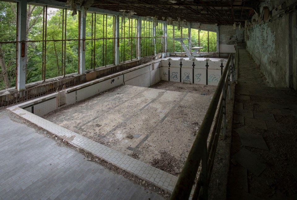  Tourists also stop off to see a drained school swimming pool before heading on to an abandoned theme park