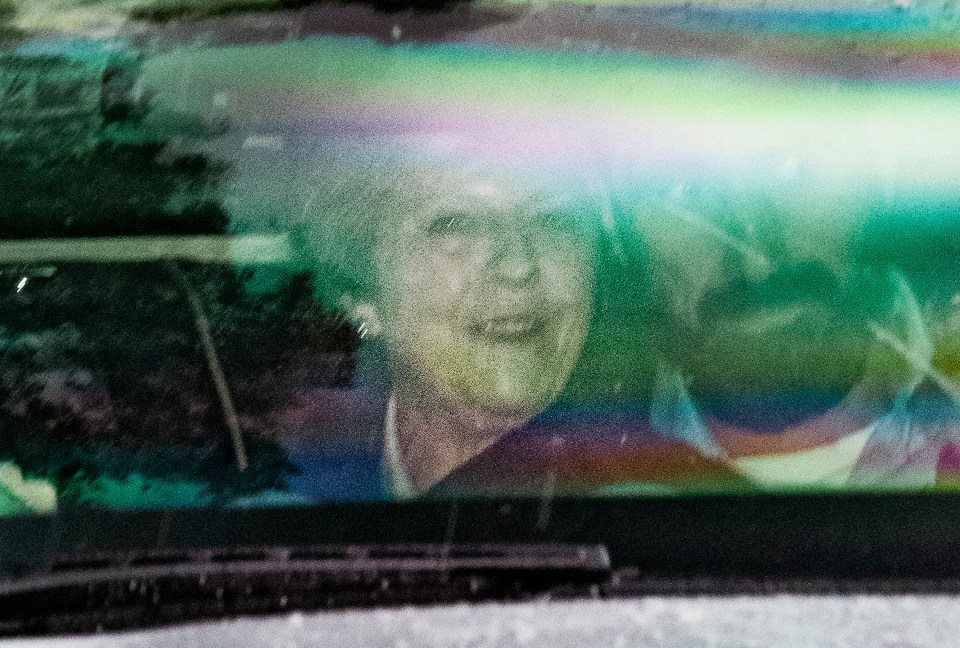  A smiling Theresa May on her last day as Tory leader