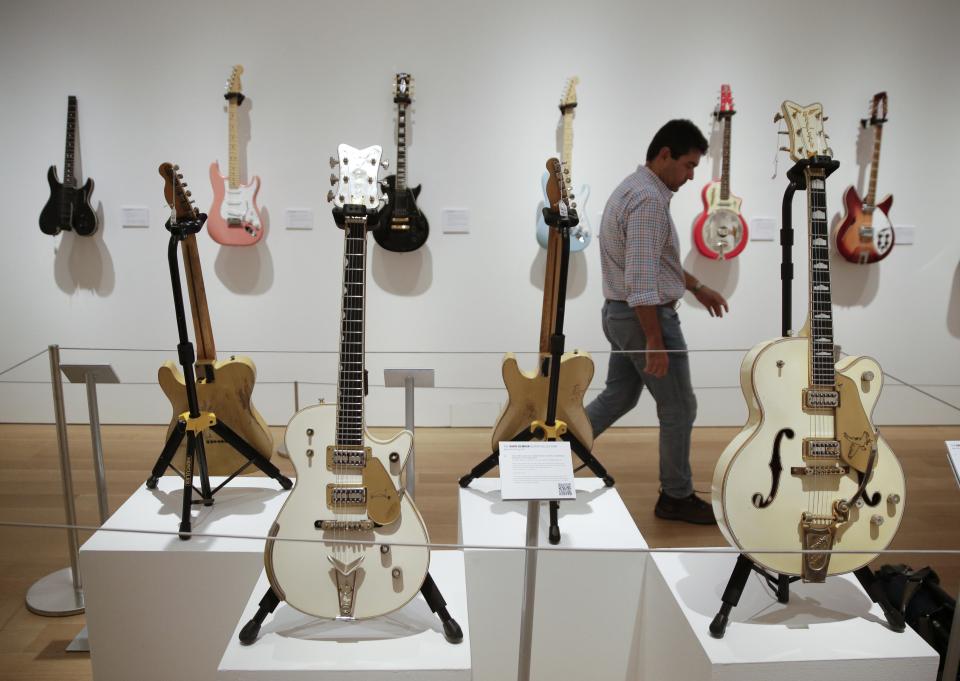  It was guitars galore at the auction in New York as more than 120 of Gilmour's instruments went up for auction