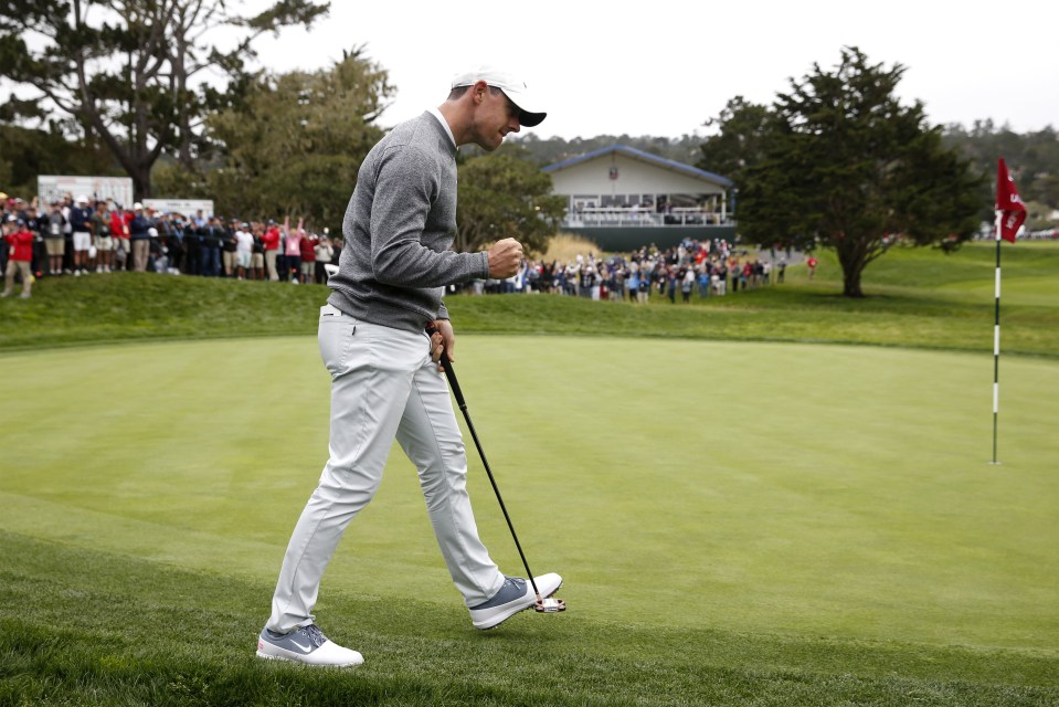  Rory McIlroy celebrates after securing a birdie from off the green at the 16th to keep his US Open hopes alive