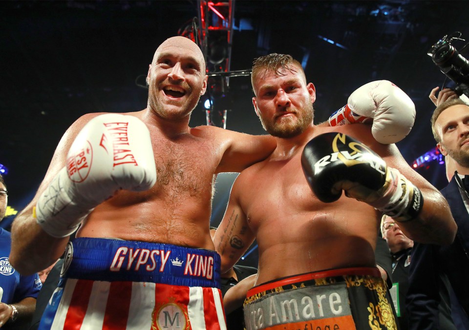 Tyson Fury celebrates with Tom Schwarz after their fight in Las Vegas