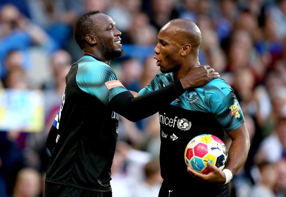 Soccer Aid's Rest of The World team's captain Usain Bolt and star player Didier Drogba