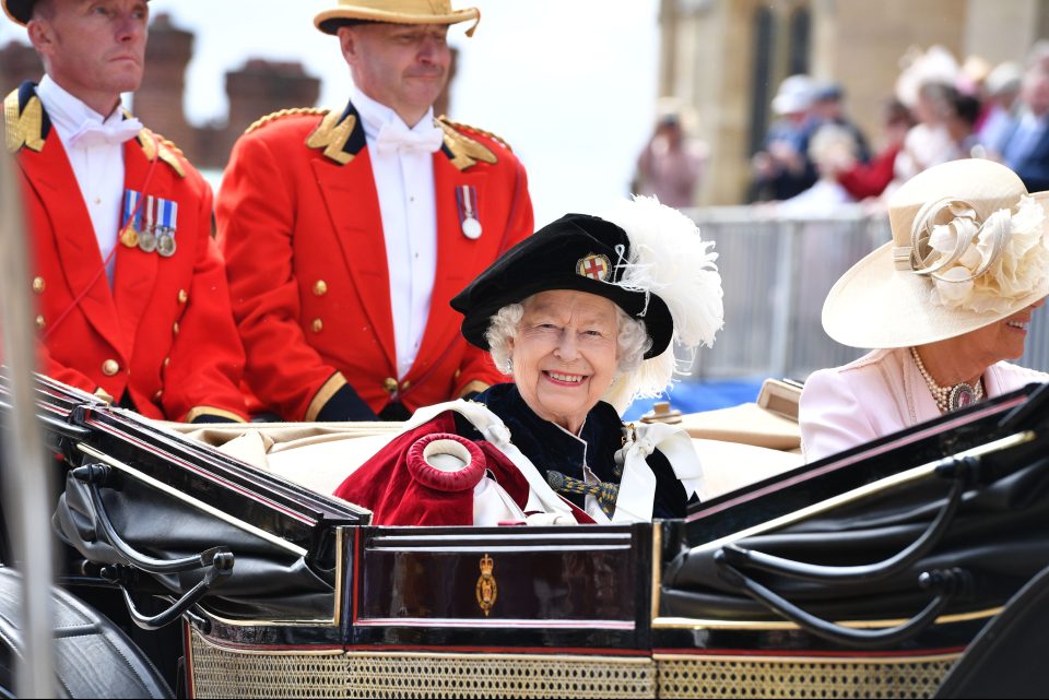  The Queen is all smiles as she sits next the Duchess of Cornwall