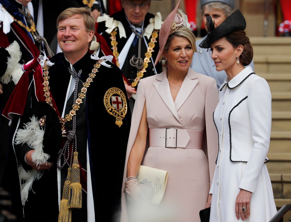  Kate and Queen Maxima share a laugh while on the steps of St George's Chapel