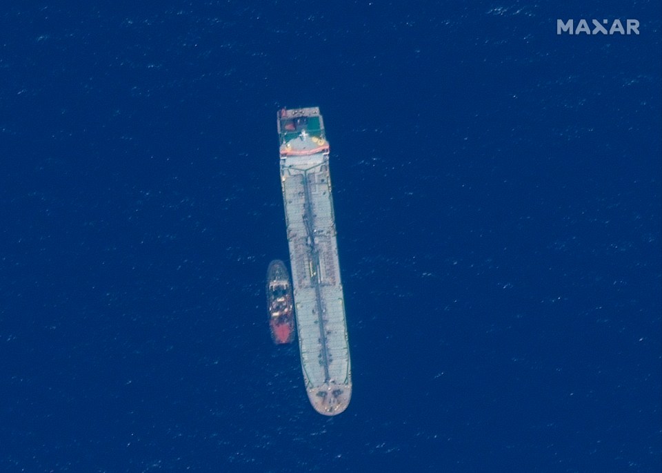 A satellite picture taken directly above shows the Iranian vessel beside the tanker