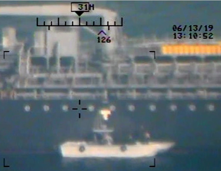 Images the Pentagon says show Iranian forces beside the Kokuka Courageous