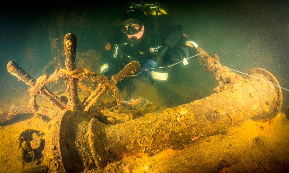 A diver inspects the helm of the SMS Marfgraf