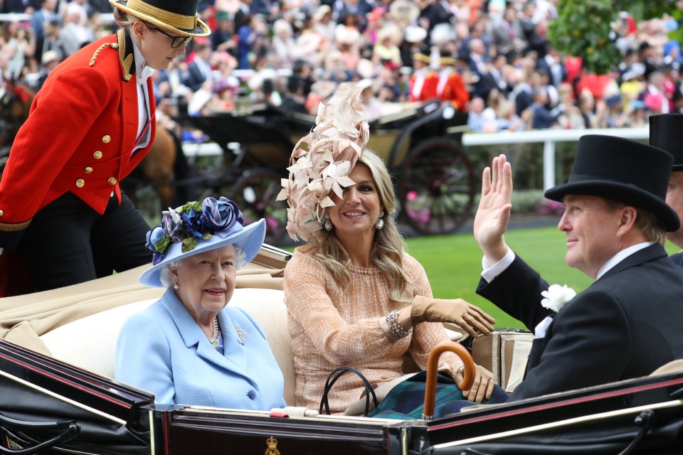 Her Majesty's guest in her carriage is Queen Maixma of the Netherlands