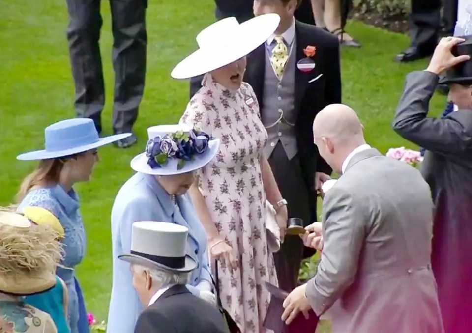  Mike Tindall appears to do a magic trick for The Queen