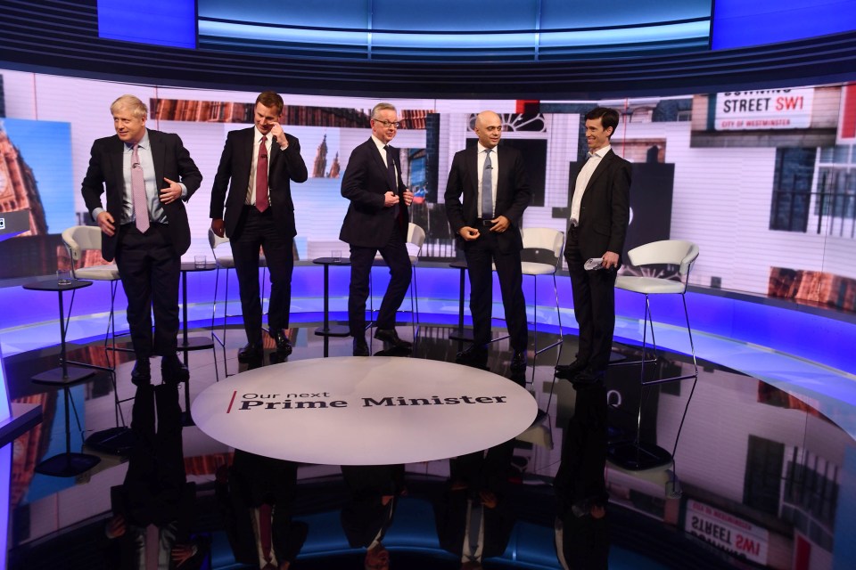  Boy band material? The five contenders awkwardly stand up at the end of the debate