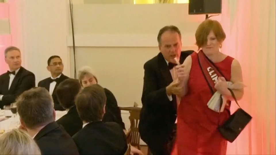 MP Mark Field manhandling a female Greenpeace protester at the Lord Mayor’s banquet