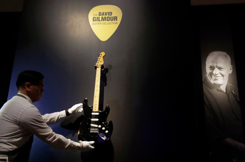  Topping the bill was the star's legendary 'Black Strat', used on iconic albums The Wall, Wish You Were Here and The Dark Side of the Moon, which went for £3.1million