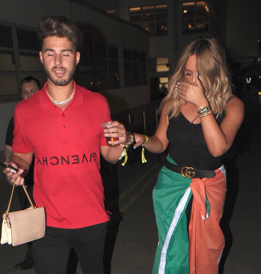  Charlotte Crosby splither trousers and clung to boyfriend Joshua Ritchie as she left Aaron Chalmers' MMA fight a little worse for wear last night