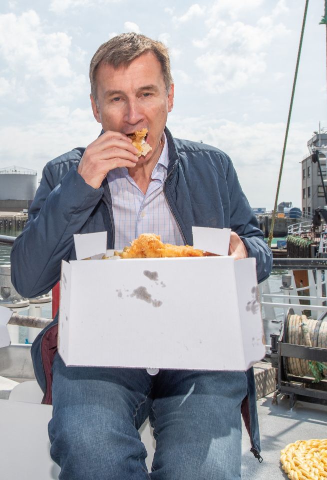  Jeremy chomping on chips during yesterday's campaigning in Scotland