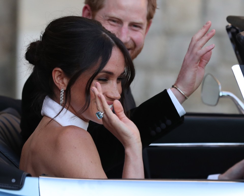 Meghan Markle wore a £75k aquamarine ring that belonged to Princess Diana, and £60k Cartier earrings, to her evening wedding reception last year