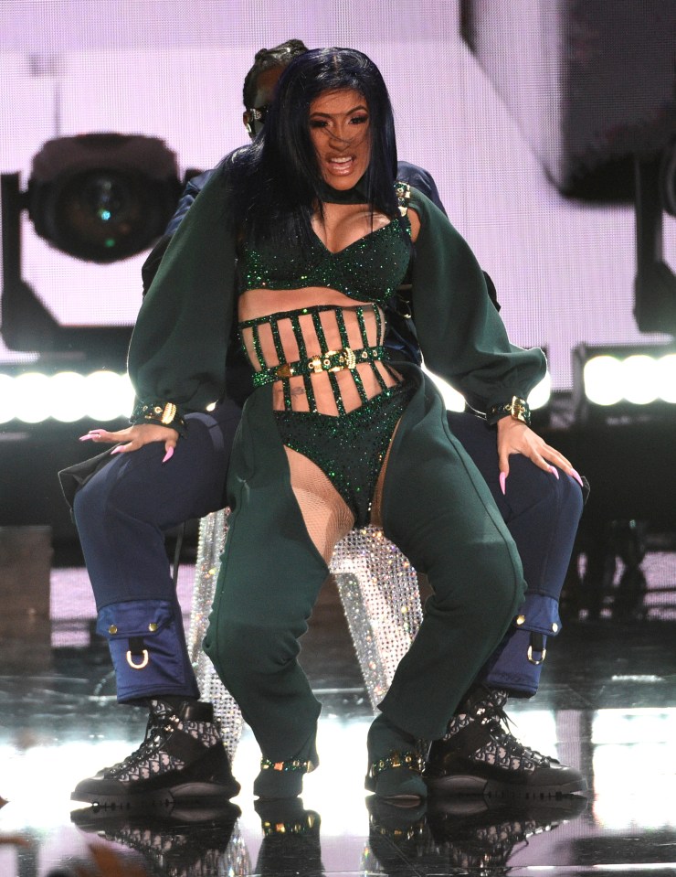  Cardi wore matching chaps and bra