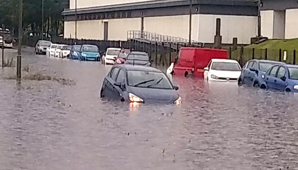 Rain storms and flooding caused chaos around Edinburgh yesterday as cars and buses were almost submerged by the torrential downpour. Similar conditions were seen again in parts of England and Wales today