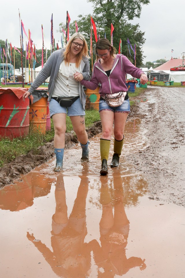 Parts of the Glastonbury Festival grounds are already covered in mud after heavy overnight rain