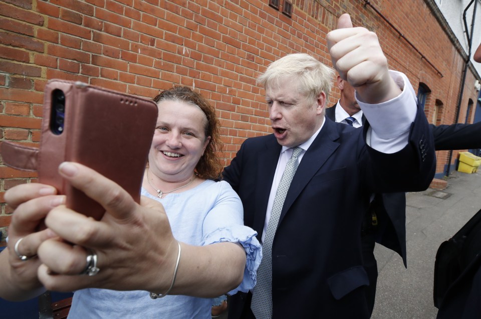 Boris snaps a selfie with a fan in Oxshott