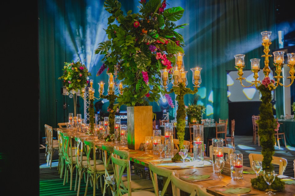  Vibrant bouquets and extravagant candelabras lined the tables