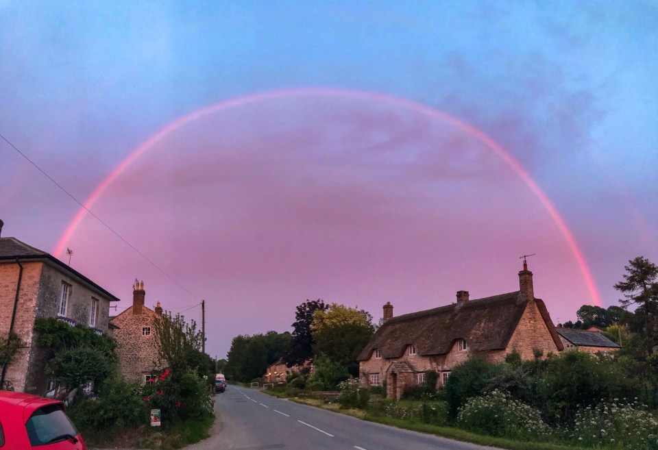 An incredible pink rainbow was snapped in Martinstown, Dorset