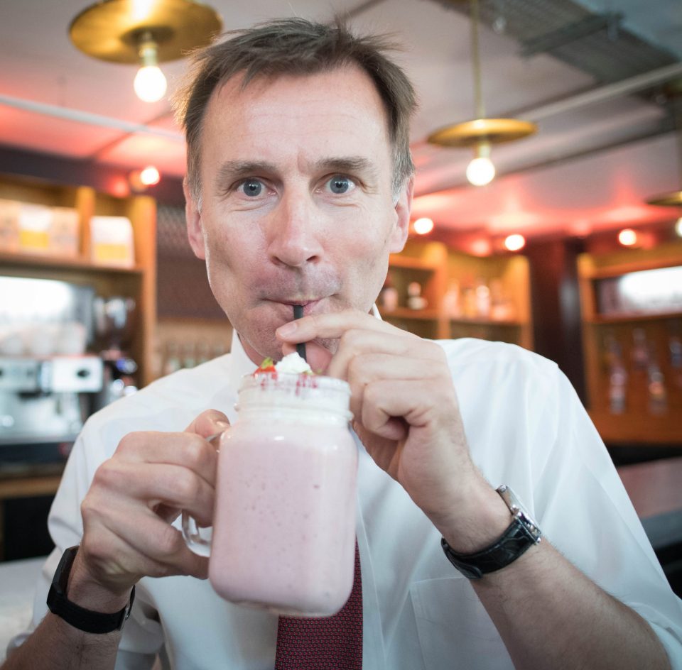 Tory leadership contender Jeremy Hunt sips a shake during a visit to Chelsmford town centre in Essex