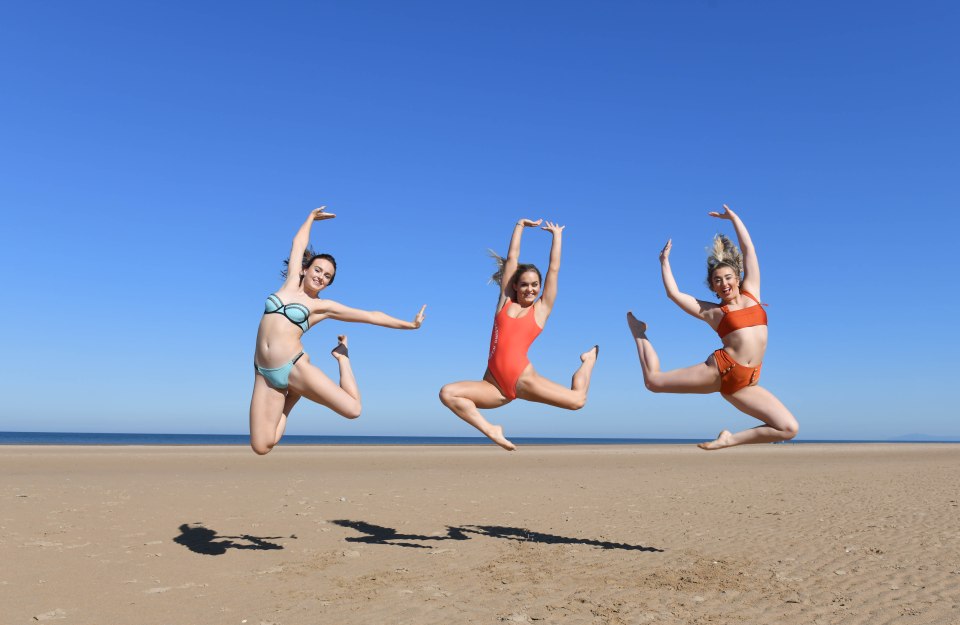 From the left: Jessica Scott-Brounett, 19 ,Ellie -Jayne Peel, 18 , and Annie Winstanley, 19, take advantage of today's warm weather