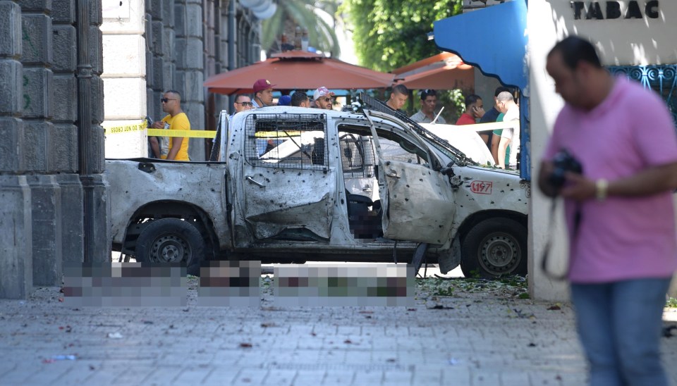  A wrecked vehicle at the scene of the suicide bombing in Tunis for which ISIS has claimed responsibility