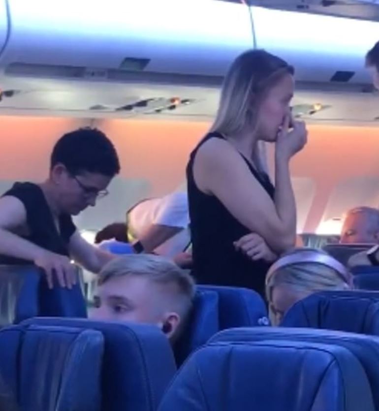 Footage shows alarmed passengers getting off insect-ridden seats