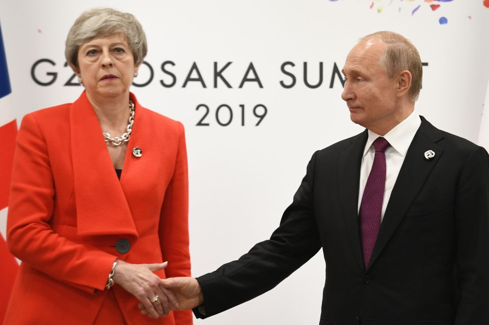  Theresa May's face said it all as she met 66-year-old Vladimir Putin at the G20 today