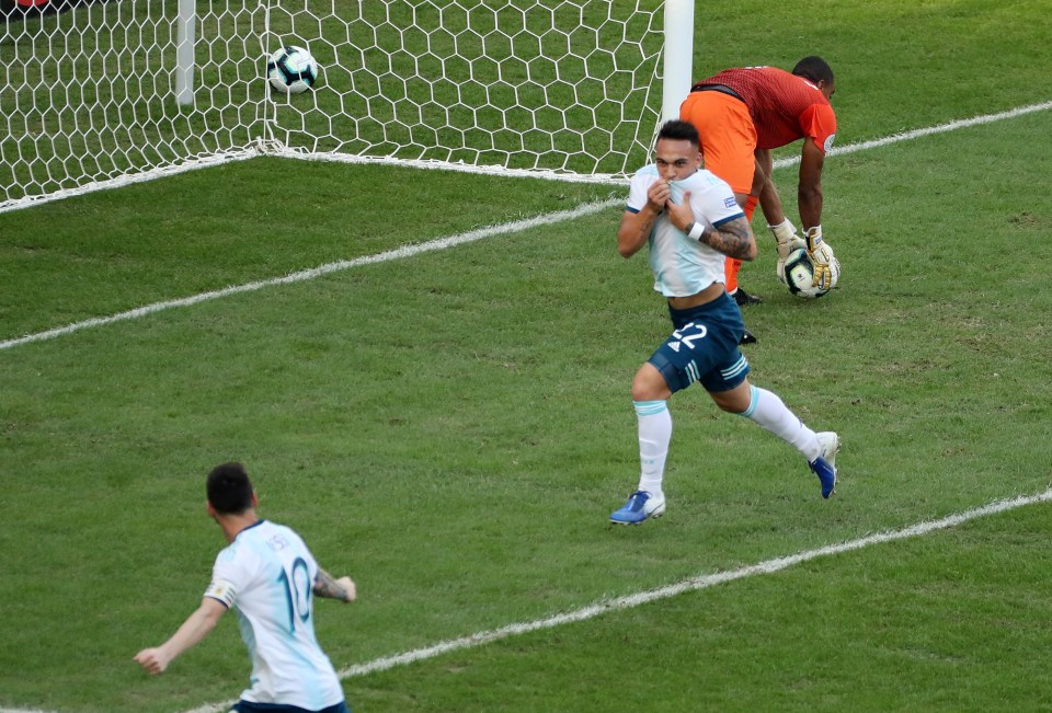  Martinez celebrates after he opened the scoring for Argentina