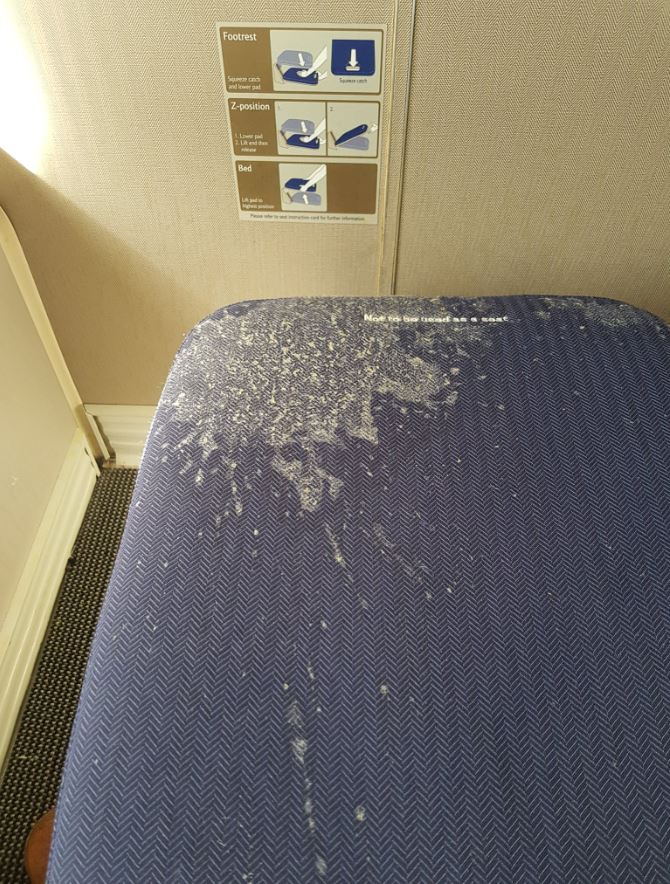 A passenger was stunned to find dried vomit on his seat during a BA flight