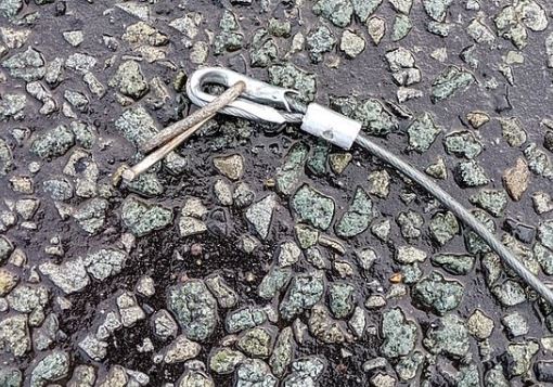 RSPCA inspectors believe this broken clip was attached to the vehicle that dragged the helpless animal along 