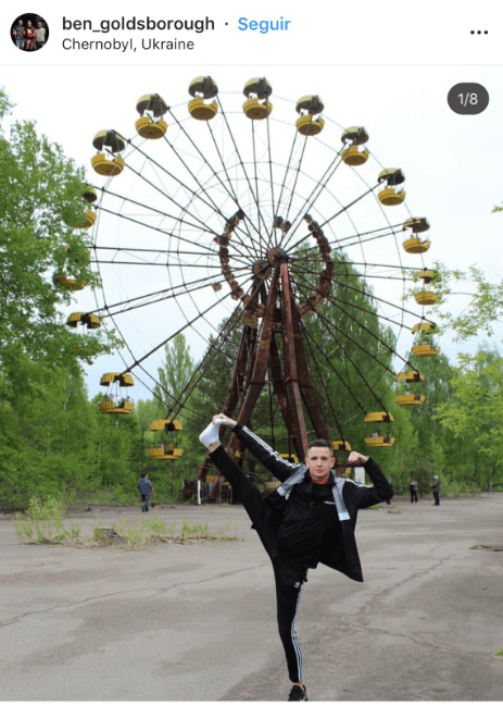  One man poses in front of the famous abandoned ferris wheel