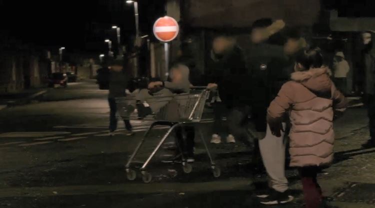  Gangs congregate in the street on 'mizzy night'