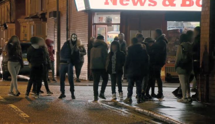  Gangs of kids gather on the street outside the couple's home