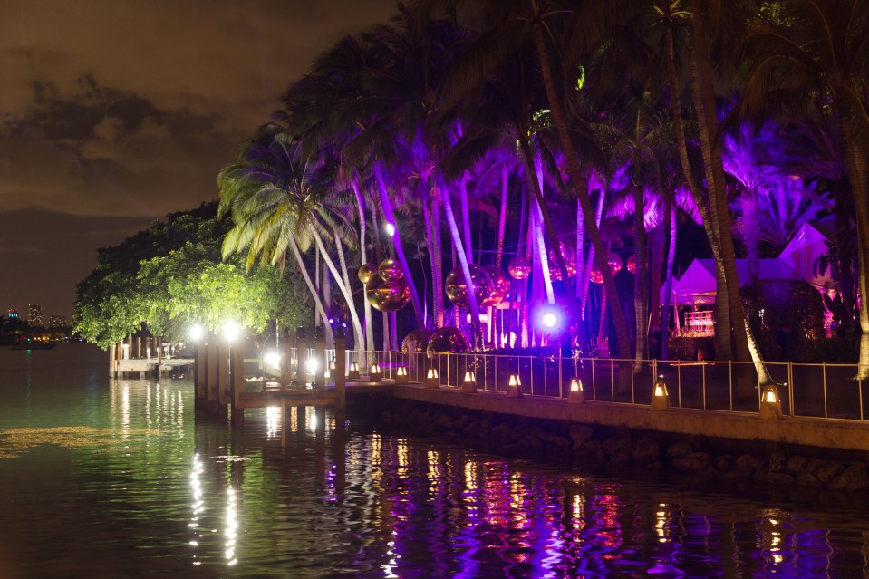  The outside of the venue was lined with palm trees and giant disco balls