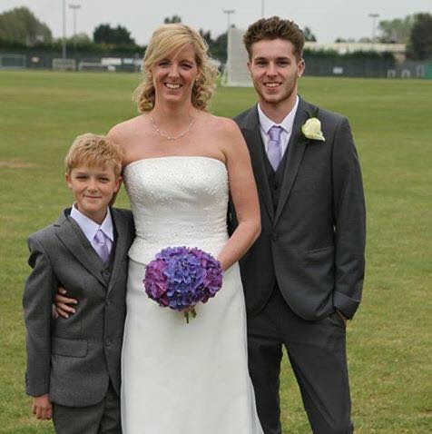  Sam Connor, 14, left, pictured with his mum Christine and brother James, was hit by a train at Chertsey after lying down on the tracks