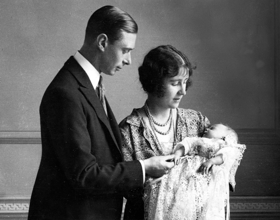  The Duke and Duchess of York - who would become King George VI and Queen Elizabeth - pictured cradling their daughter in 1926